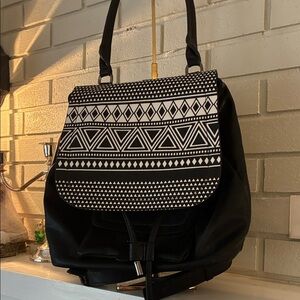Chic Black and White Patterned Backpack